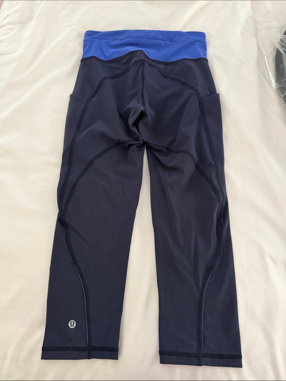 lululemon athletica cropped Navy Leggings with Blue Waistband. Side pockets